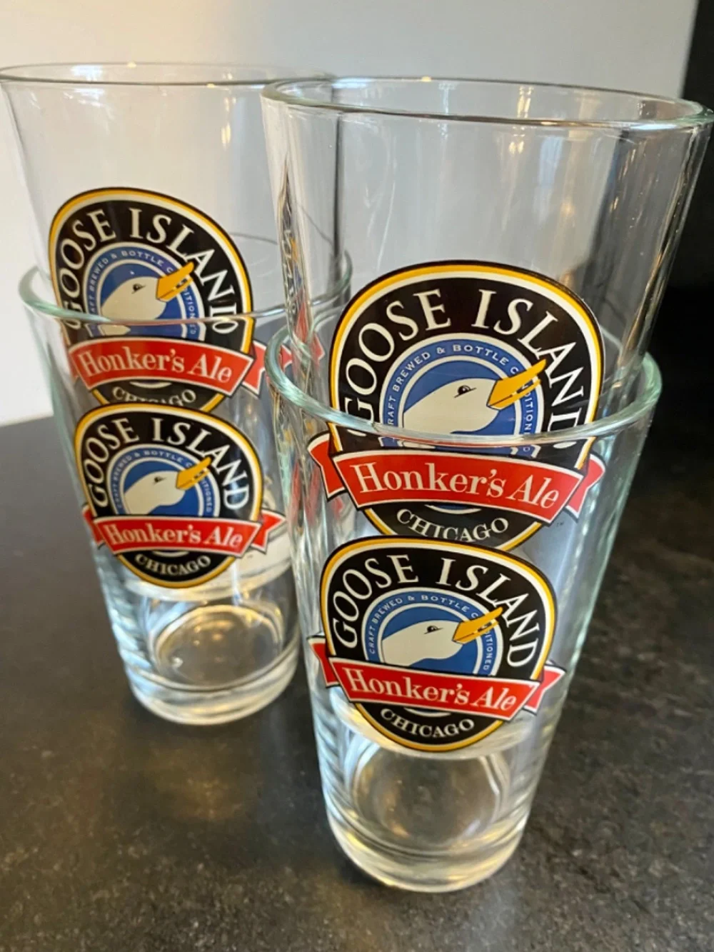 Four Beer Glasses from Goose Island, Chicago. Sturdy, Preowned, Minimal Use.